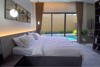 Picture of Luxurious pool villa with a modern minimalist design @ M Space
